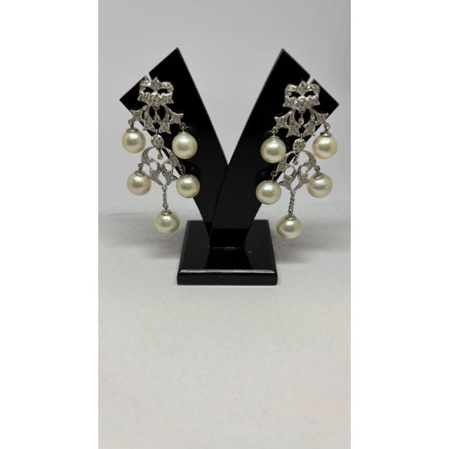 Gemstone details Diamond weight: 49.47 cts Pearl weight: 1.35 cts 14K gold Gross weight: 19.13 grams Gold weight: 8.96...