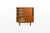 This beautiful vintage highboard from the 1960s is crafted from warm teak wood and combines timeless mid-century design...