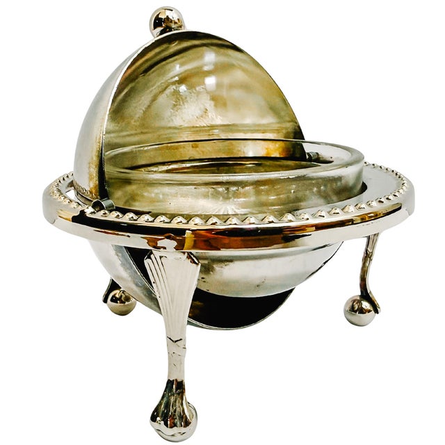 A classic English roll-top serving dish with a beautifully revolving chased dome lid. This versatile piece is...