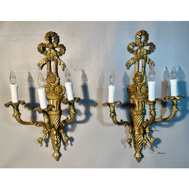 Light up your imagination with function and beauty with these French inspired electric wall sconces. Made of gilded, solid...