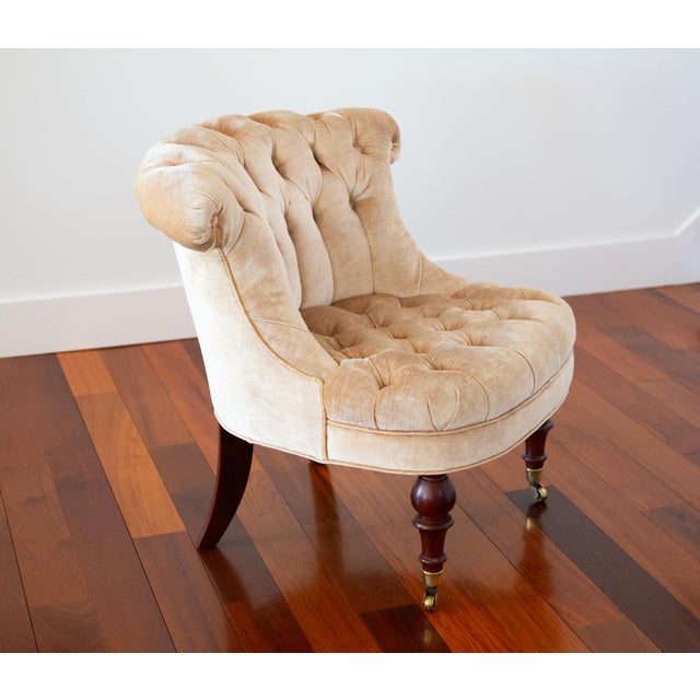A luxurious petite boudoir chair from Baker's Milling Road Collection. This chair is a beautiful example of their heirloom...