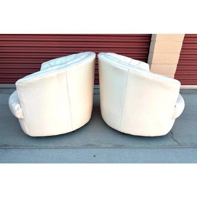 Amazing Postmodern Leather Swivel Chairs -a Pair in the style of Milo. Super comfy and perfect for a MCM home. made by...