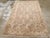 This Early 20th century Indian Lahore rug, measuring 4' 0" x 5' 11", is a striking example of the artistry and refinement...