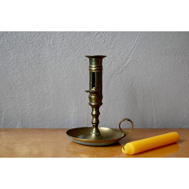 This antique brass candlestick is a timeless everyday object that will soon become a poetic decorative asset. A key allows...