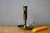 This antique brass candlestick is a timeless everyday object that will soon become a poetic decorative asset. A key allows...