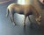 Vintage metal horse figurine. Brown patina. Matte finish.