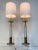 Elegant Mid-Century Table Lamps - Pair, Tommi Parzinger (?) These gold and silver tone lamps are elegant Art Deco /...
