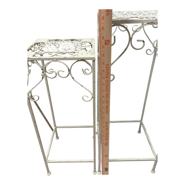 Pair of Vintage Indoor/Outdoor Hollywood Regency Graduated Metal Plant Stands, Distressed Ivory Scrollwork For Sale In Indianapolis - Image 6 of 10