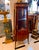 Showcase your treasured collectibles in timeless European elegance with this exquisite French Bombe Curio Cabinet....
