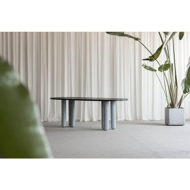 A remarkable expression of Postmodern design sensibility, this rare dining or working table was designed by Italian...