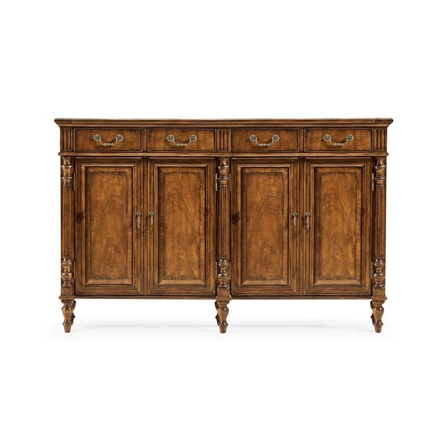 The sideboard offers a fresh take on classic English cabinetmaking, inspired by Late Georgian styles. Its long, slim shape...