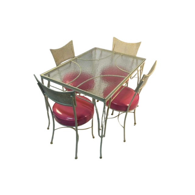 Transform your dining space into a stylish oasis with this Mid Century Modern 1950s-Table and chairs set! The set includes...