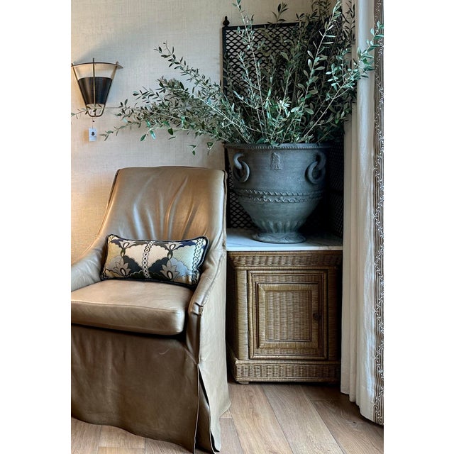Pair of Verellen leather skirted slip-covered chairs. Made with Verellen's signature knife-edge and double-needle stitch...