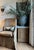 Pair of Verellen leather skirted slip-covered chairs. Made with Verellen's signature knife-edge and double-needle stitch...