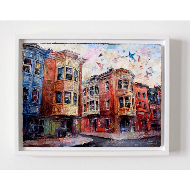 This mixed media piece captures a vibrant street scene, showcasing a charming row of buildings with intricate...