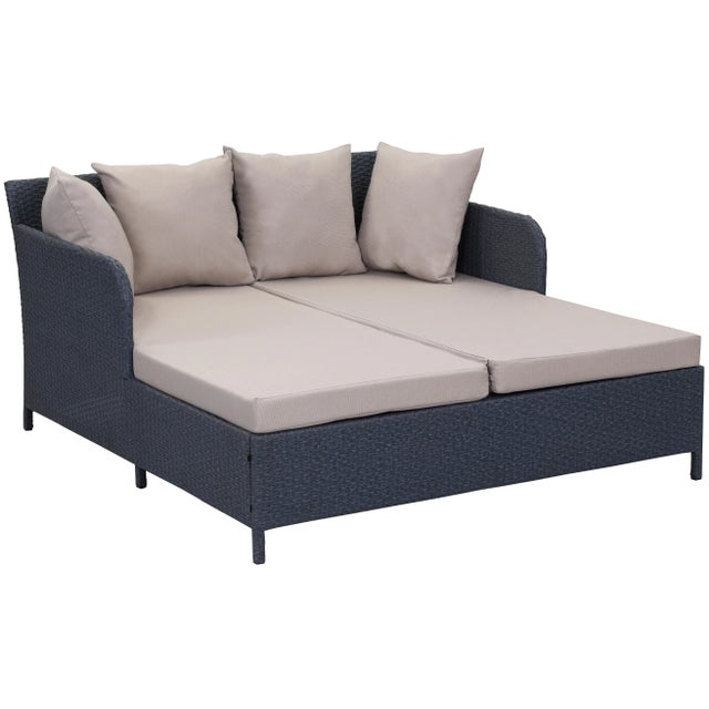 Lounge in the luxury of a posh South Beach hotel with this rattan woven daybed in titanium gray with weather proof...