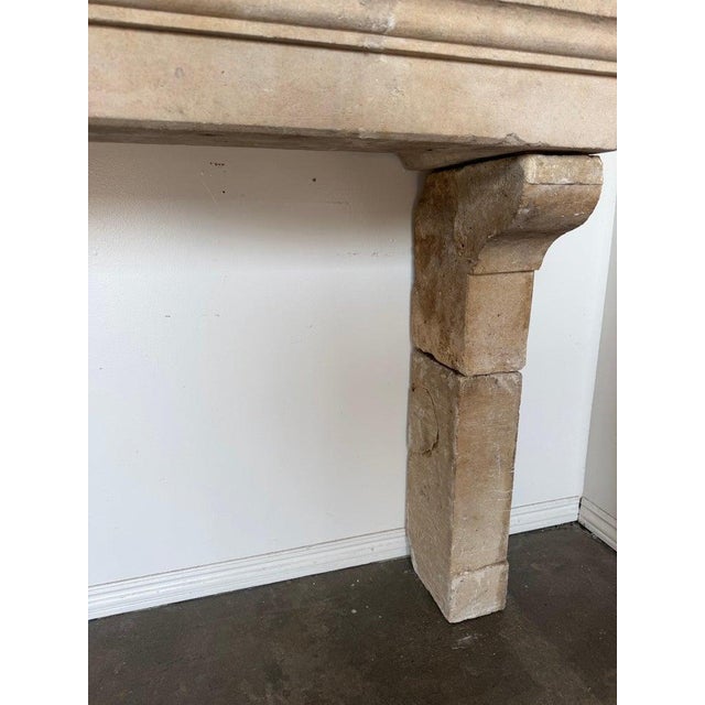 Petite 18th Century French Limestone Fireplace Mantel With Scrolled Corbels For Sale In Los Angeles - Image 6 of 17