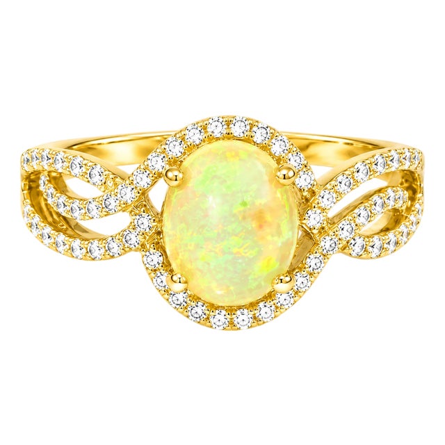 Late 20th Century 14K Yellow Gold Ethiopian Opal Diamond Filigree Cocktail Ring Estate, Size 7.5 For Sale