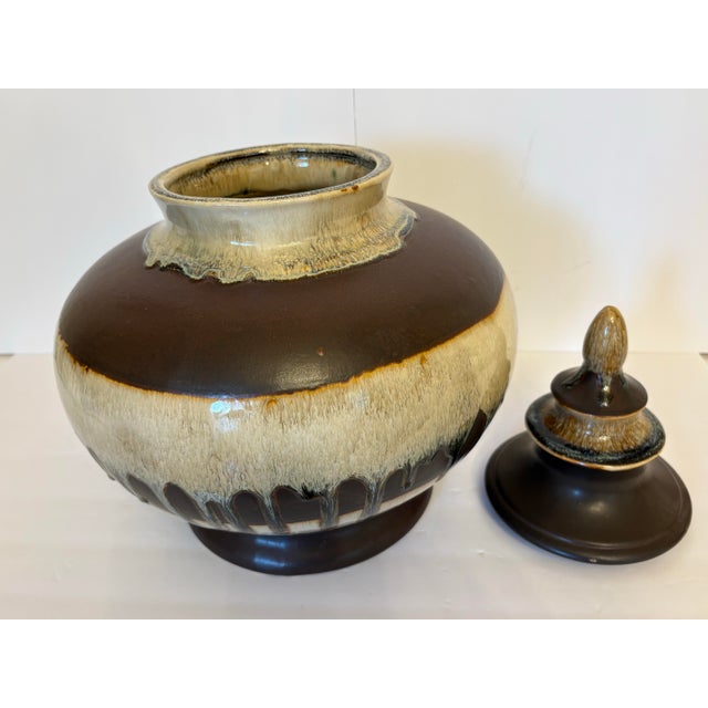 This is a vintage style Robinson-Ransbottom brown drip glaze covered ceremonial vase. This one is not meant for food...