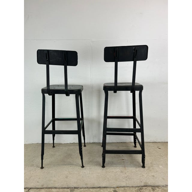 Pair of Black Painted Industrial Stools With Unique Patina For Sale - Image 4 of 12