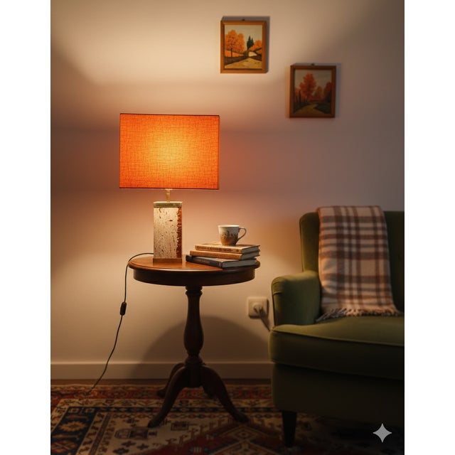 1980s table lamp in travertine marble and epoxy resin with a beautiful orange linen shade. The lamp measures 36 x 12.5 x...