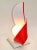 Mid-Century Modern Red & White acrylic sculptural table lamp by acrylic designs. The Lamp has a milk glass globe and takes...