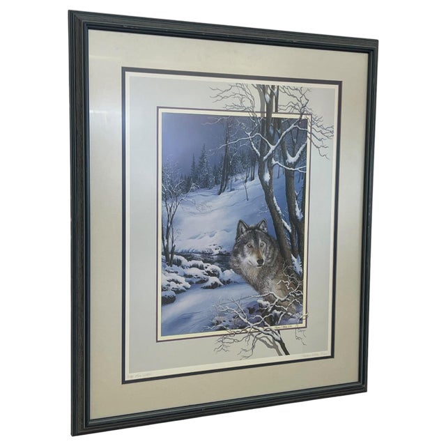 Framed wildlife print by artist Lawrence R. McKee, titled "Wolf "Lone Watcher."" The composition depicts a gray wolf in a...