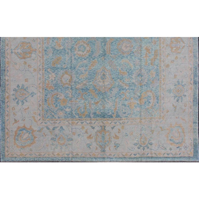 Square Turkish Oushak Rug by Keivan Woven Arts Measures: 10'10 x 12'1. Blue, Silver, Taupe Oushak rug from Turkey, Keivan...