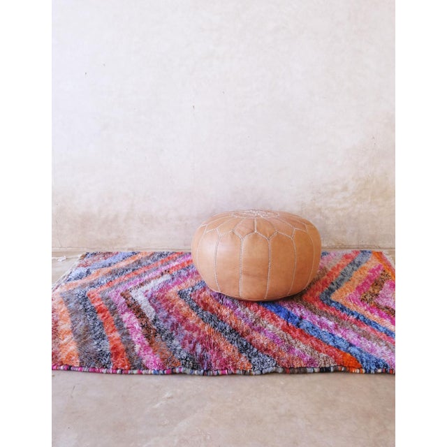 Pastel Moroccan Rug – Handwoven Wool with Chevron Stripe Design (One of a Kind) This high-quality Moroccan rug is a one-...