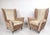 This stylish pair of Mid-Century lounge chairs feature high sculpted seat backs, comfortable and accommodating seats and...