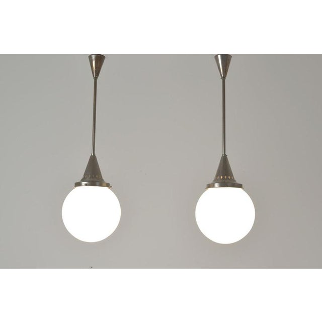 Article number: 2027 article name: pair of sphere lights designer: unknown year: around 1928 manufacturer: unknown...