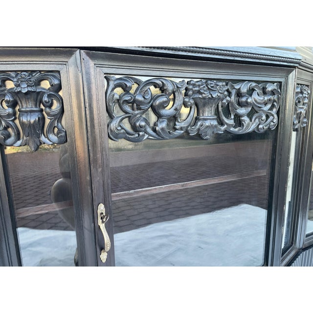 A monumental antique neo-renaissance display cabinet/bookcase, representative of european historicism from the second half...