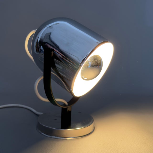 An exceptional and rare masterpiece of italian lighting, perfect for enhancing desks, professional studios, or spaces with...