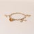 Modern Vintage 14k Yellow Gold Multi Objects Charm Bracelet For Sale - Image 3 of 10