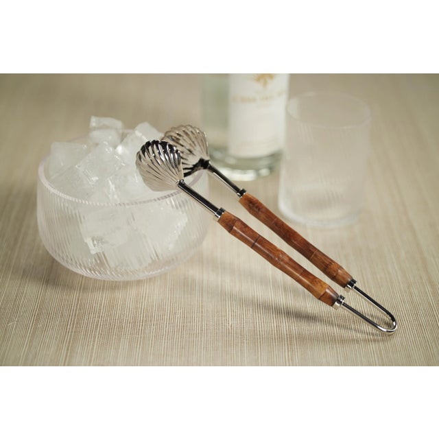 Bring undersea treasures to your table with our Treviso Ice Tong. The lovely bamboo handle and the shell-inspired heads of...
