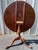 Antique mahogany round tilt-top tea or parlor table. The solid wood table has a lovely aged patina; measures 36" in...