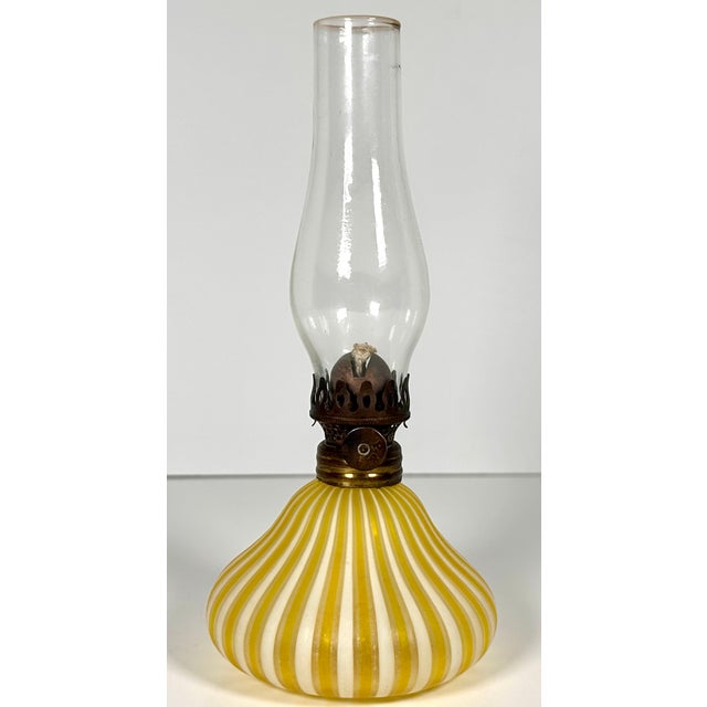 DeVilbiss Murano Miniature Oil Lamp for your consideration. The lamp measures approx. 7 3/4 inches tall with chimney; 3...