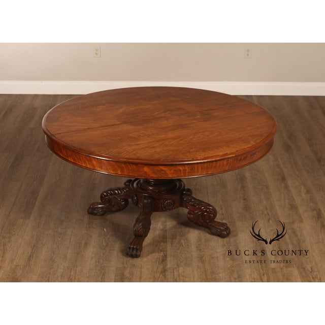 High Quality Antique American Made Round Oak Dining Table Featuring A Substantial 57 Inch Top With Rich Figured Grain And...
