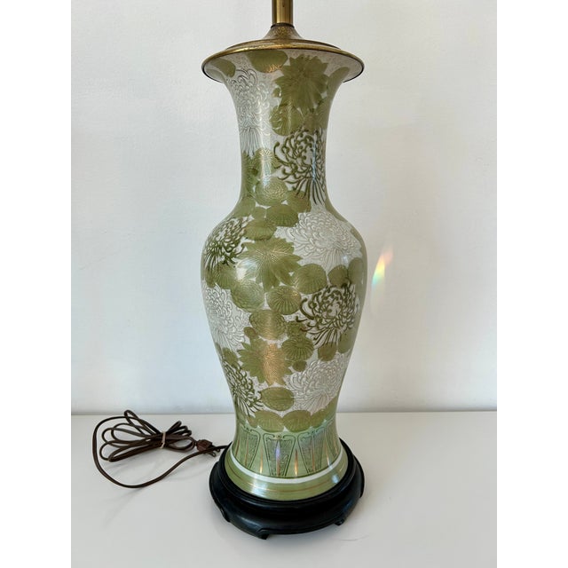 This elegant piece is a vintage Japanese Kutani Porcelain vase that has been converted into a table lamp. It features a...