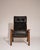 Pair of lounge chairs by Yngve Ekström for Swedese, Sweden, 1970s. Featuring sculptural plywood frames in rich wengé...