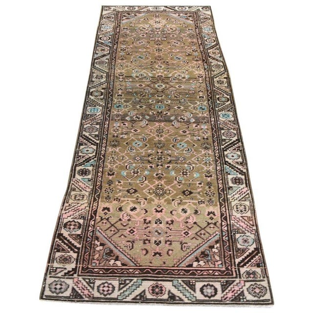 Hand-knotted with care using traditional rug-making techniques, this wool rug blends timeless craftsmanship with a modern...