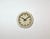 This wall clock was produced by Siemens in Germany during the 1950s. It features a beige metal frame, a metal dial and a...