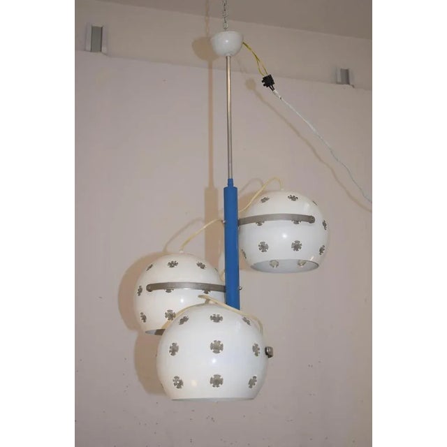 Chandelier in enamelled metal and glass, italian 60s production. good condition (see photos). dimensions: h = 80; l = 44;...