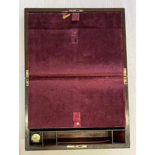 Antique English Rosewood Writing Box mounted on a new mahogany stand as a table. The table is 10 deep, 15 wide and 25...