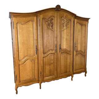 Vintage French Louis XVI Style Carved Oak 4-Door Armoire For Sale