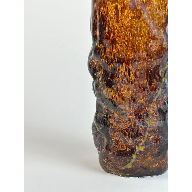 A bark textured art glass vase by Mdina, handcrafted in Malta during the 1970s. The surface treatment evokes the classic...