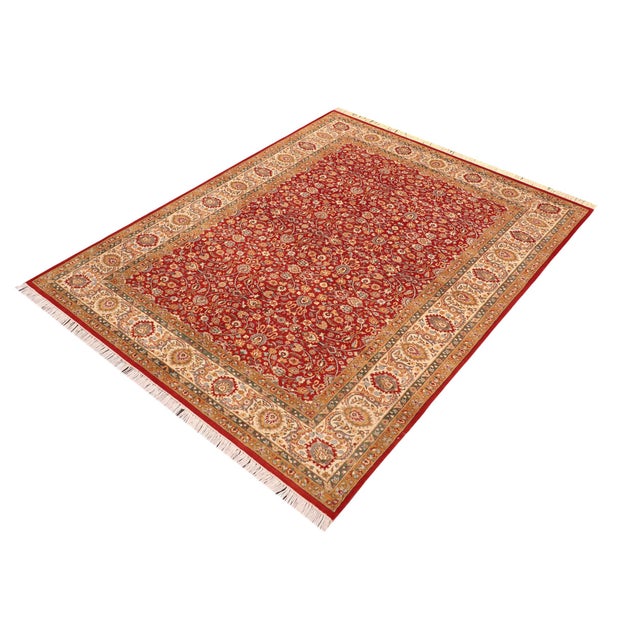 Designed with mesmerizing intricacy and gorgeous color palette, this hand-knotted masterpiece demonstrates the beauty and...