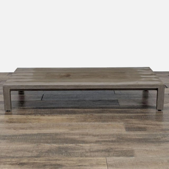 Features a low-profile, with a slatted top and constructed of weathered teak. Brand: Restoration Hardware. Model: Aegean....