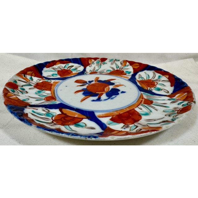 Antique Porcelain Imari Plate Adorned With Vibrant Floral Motifs From Japan - Circa 1900 For Sale - Image 9 of 10