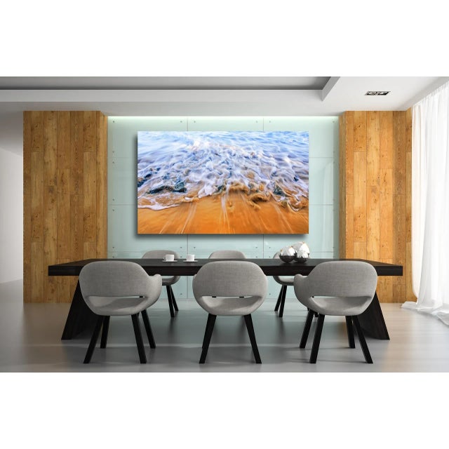 "Photographed on the Hawaiian island of Kauai, SHIFTING SANDS illustrates the never ending battle between saltwater and...